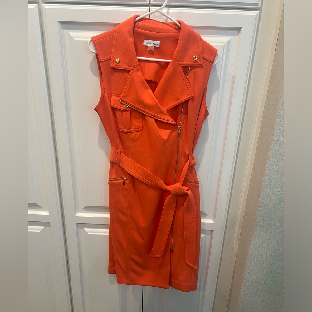 New never worn. Bright and classic shirt dress.  With gold buttons and zippers.